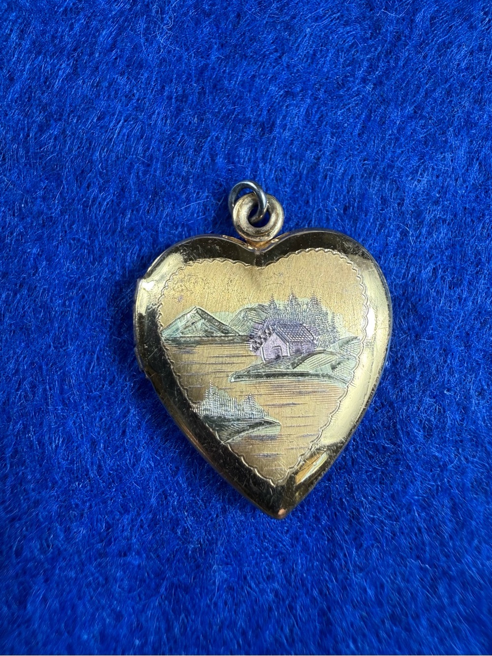 Vintage 12kt Gold filled on Sterling Etched Cabin scene Heart shaped Locket.